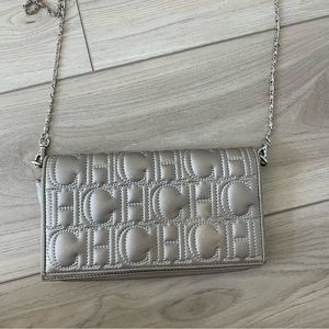 Silver Carolina Herrera clutch
